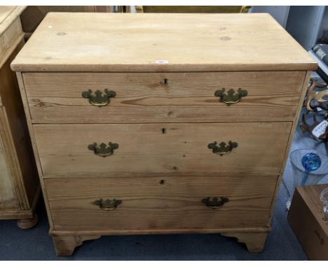 A 19th century pine chest of three long drawers on bracket shaped feet 91cm h x 92cm w Location: 