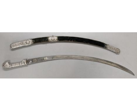 A late 19th/early 20th century Shaska sabre presentation style with a white metal mounted scabbard, the blade 79.5cm long Loc
