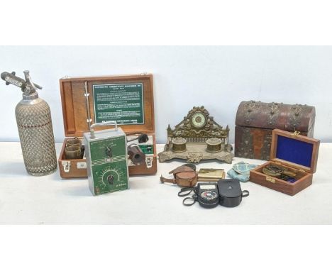 A mixed lot to include a 19th century ink well stand with a clock, along with a Weston master exposure meter, a electrolytic 