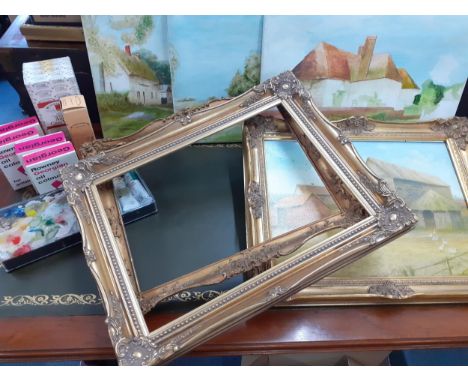 A mixed lot to include a brass fire screen, Revelations suitcase bed quilt, oil paintings, canvas's, frames and oil paintsLoc