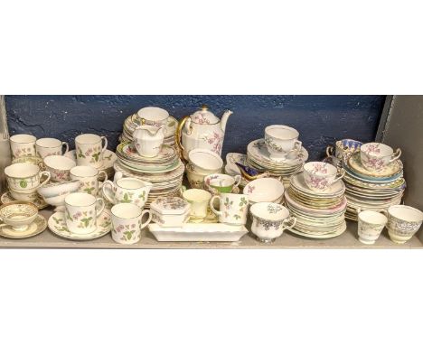 A mixed lot to include Royal Crown Derby paperweight along with Wedgwood cups and saucers in wild strawberry pattern along wi