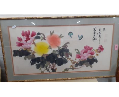 A 20tt century framed Chinese painting of flora and butterflies, signed and mounted in a gold painted bamboo style frame toge