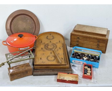 A mixed lot to include Le Creuset cooking pot, a vintage bagatelle board and balls, carpet bowls and other itemsLocation 