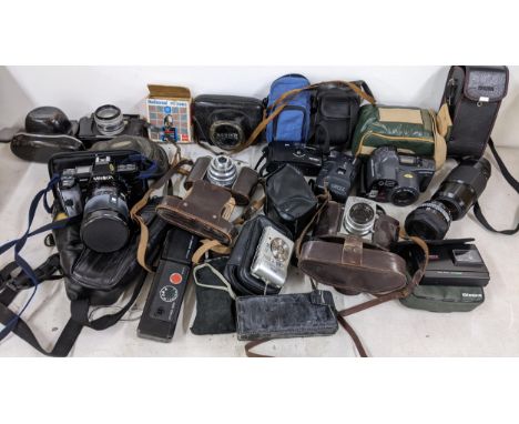 Mixed cameras and accessories to include a Minolta 7000, Exakta, Olympus and othersLocation: 