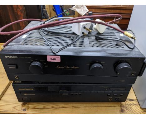 A stacking Pioneer stereo amplifier A-400, and a Marantz CD player CD-72 with remote Location: 