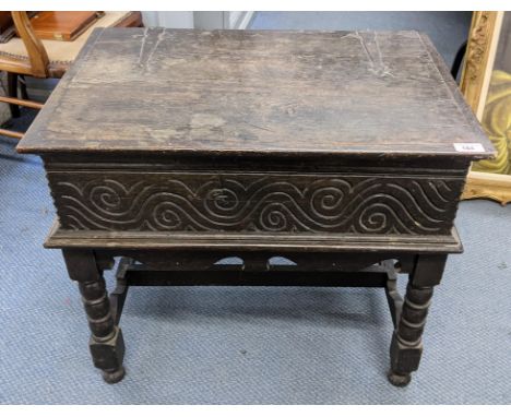 A late 17th/early 18th century oak bible box raised on bobbin turned legs, 56cm h x 65cm wLocation: 