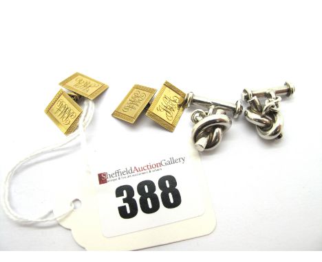 A Pair of 9ct Gold Gent's Cufflinks, the engine turned rectangular panels, on chain connections, initialled; A Pair of Modern