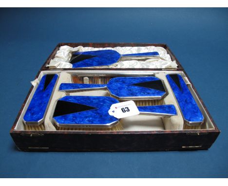 A Hallmarked Silver and Enamel Backed Five Piece Dressing Table Set, C&amp;A, London 1931, of lapis lazuli effect, comprising