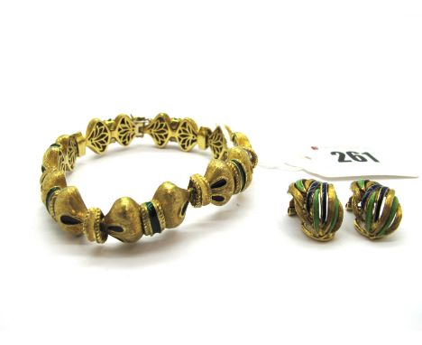 An Italian Fancy Link Bracelet, of shaped textured design, highlighted in green and blue enamel, to concealed snap clasp, sta