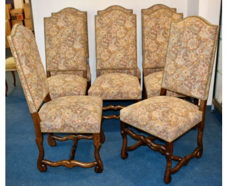 Set of eight oak framed high backed dinning chairs upholstered in a floral tapestry fabric. H116cm,&nbsp; Condition : Good , 