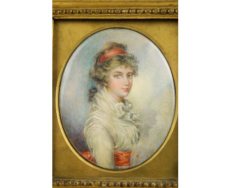 A late 18th/ early 19th Century fine miniature on ivory, Portrait of a lady, mounted in a carved wooden frame, with label to 