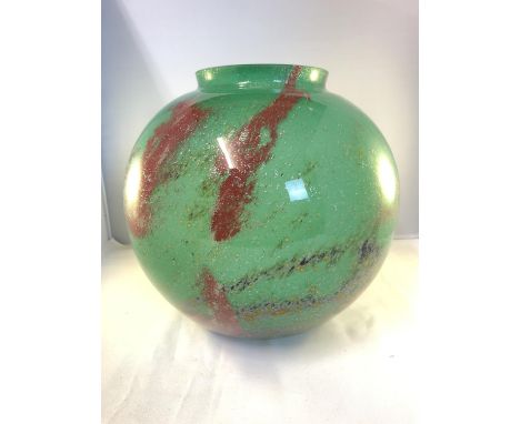A large WMF Ikora glass globe vase, the green ground with brickred, brown and yellow inclusions with silver mica throughout, 