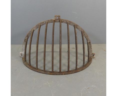 A vintage cast iron hay rack. Width 82cm, height 44cm, depth 34cm.