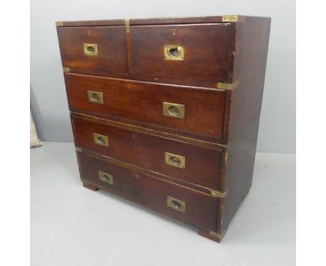A 19th century mahogany two-section campaign chest of two short and three long drawers, the locks in the long drawers marked 