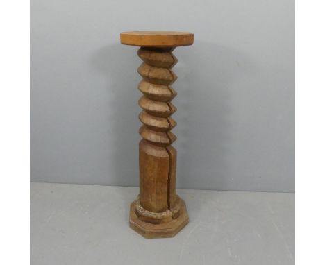 A French elm spiral turned column plant stand, with oak pedestal and base. Width 32cm, height 105cm.