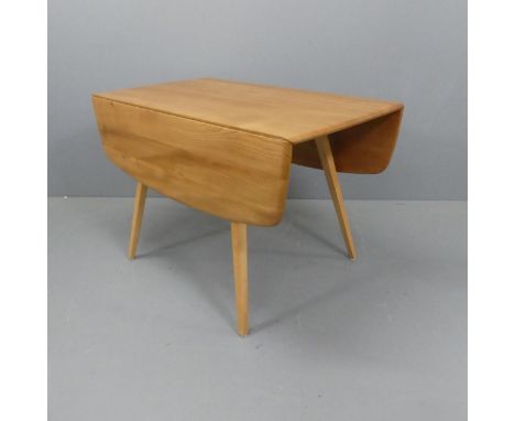 ERCOL - A mid-century model 383 drop-leaf table with blue maker's label. Length 113cm, height 72cm, width 61cm (extending to 