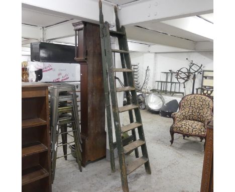 A vintage pine folding step ladder. Height 200cm.