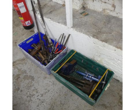 Two boxes of various vintage clamps and vices.