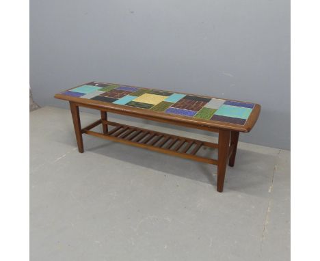 A mid-century teak tile-topped coffee table, in the manner of Malkin Johnson for Heal's. Width 116cm, height 40cm, depth 38cm