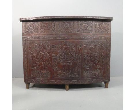 A mid-century Peruvian tooled leather clad bar, with embossed Aztec design. Width 143cm, height 109cm, depth 61cm.