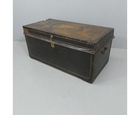A 19th century studded leather covered camphor wood trunk with brass mounts. Width 105cm, height 49cm, depth 53cm.Generally g