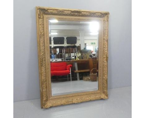 A 19th century French rectangular gilt gesso framed and bevel edged wall mirror. Width 98cm, height 128cm.