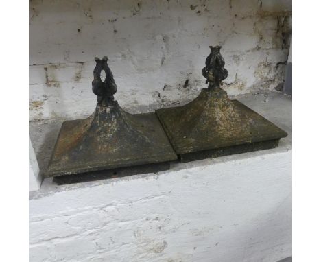 A pair of cast iron gate-post finials. Width 33cm, height 28cm.