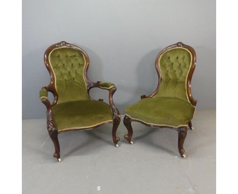 A Victorian walnut and button-back upholstered open arm parlour chair, and a matching slipper chair. (2)
