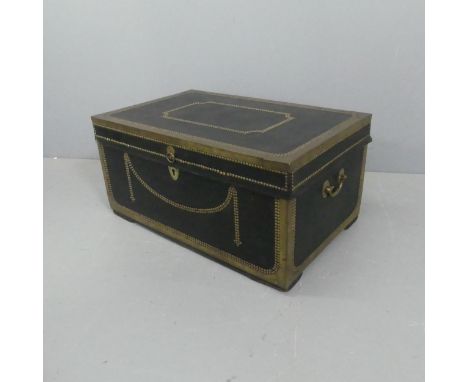 A 19th century studded leather covered camphor wood trunk with brass mounts. Width 85cm, height 42cm, depth 53cm.Good conditi