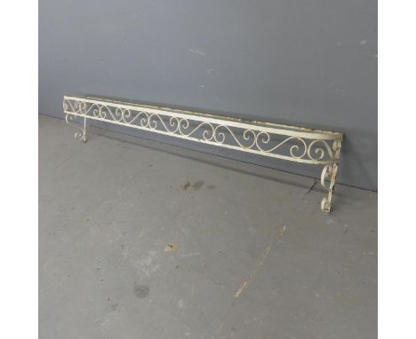 A painted wrought metal hanging shelf with inset glass. Width 137cm, height 24cm, depth 15cm.