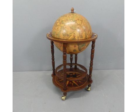 A reproduction globe-design drinks cabinet. W51cm, H89cm.