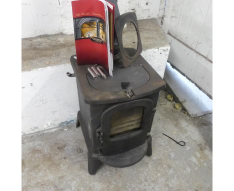 A Vermont Castings Aspen II multifuel stove, including instruction manual, handles and a two-piece flu. Width 41cm, height 60