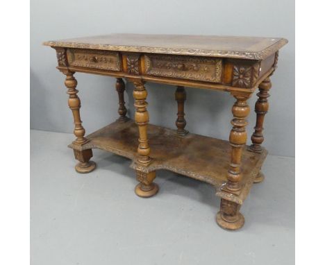 A 19th century continental walnut two-tier buffet / serving table, with two drawers, turned supports and carved decoration. W