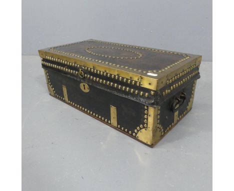 A 19th century studded leather covered camphor wood trunk with brass mounts. Width 54cm, height 21cm, depth 28cm.Good used co