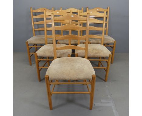 A set of six modern light oak and upholstered ladder-back dining chairs.