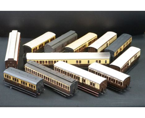 12 O gauge items of kit built coaches featuring trucks and vans, plastic &amp; metal constructions, overall very well made an