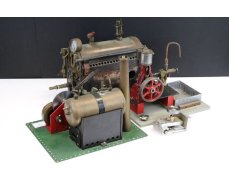 Live Steam - Stuart single cylinder vertical stationary engine, suspended on an A-frame support (20cm high); together with a 