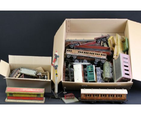 24 O gauge items of rolling stock, mainly tin plate Hornby examples, featuring coaches &amp; wagons plus a group of trackside
