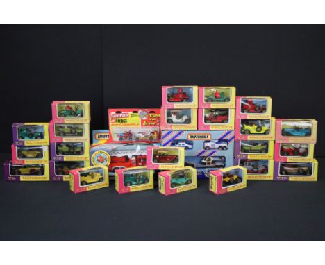 26 Boxed diecast models to include 23 x Matchbox Models of Yesteryear in pink &amp; purple boxes, Convoy CY202 set, Matchbox 