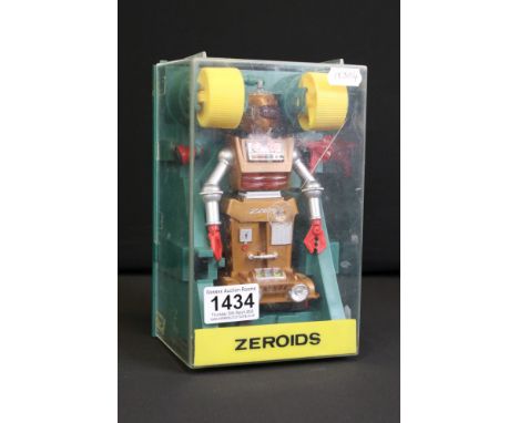 Cased Ideal Toys Zeroids ' Zobor ' motorised plastic robot figure, in orange &amp; metallic grey (showing some surface wear, 