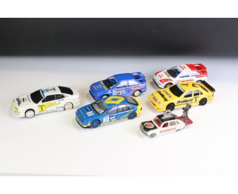 Five Hornby Hobbies Scalextric slot cars to include Renault Laguna, Mercedes C699, etc (showing play wear, some missing wing 