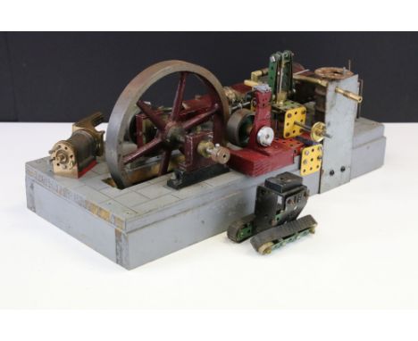 Live Steam - An early 20th century horizontal mill engine, with a steel 7 inch spoked flywheel and steel crankshaft, mounted 