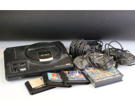 Retro Gaming - Sega Mega Drive console with 2 x controllers, boxed Mega Games I game and 3 x unboxed gaming cartridges (Sonic