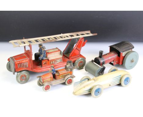 Four mid 20th C tin plate vehicles to include Chad Valley Harborne, wind up steam roller (England), and 2 x fire engines, one