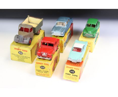 Five boxed Dinky diecast models to include 139 Ford Consul Cortina in metallic blue, 143 Ford Capri, 159 Morris Oxford Saloon