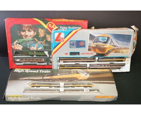 Three boxed OO gauge train sets to include Hornby R176 Flying Scotsman set, Lima Inter City 125 set (damaged box) and Hornby 