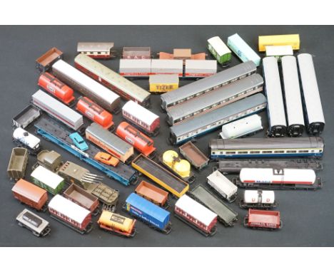 Over 45 OO gauge items of rolling stock to include coaches, car transporter, tankers, vans etc featuring Hornby, Mainline, Li