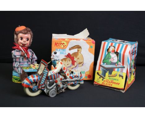 Four mid 20th C tin plate toys to include boxed TPS (Japan) Mechanical Joe The Xylophone Player, a Japanese clockwork Monkey 