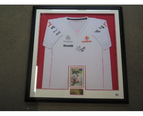 A framed Lewis Hamilton signed Mercedes Benz T-shirt together with photograph dated 5th November 2008 - This was the first ye