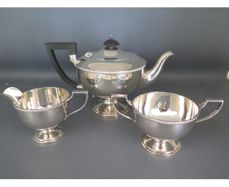 An Edwardian three piece tea service of circular form by Walker & Hall, Sheffield 1938/39 - Weight approx. 26.5 troy ozCondit